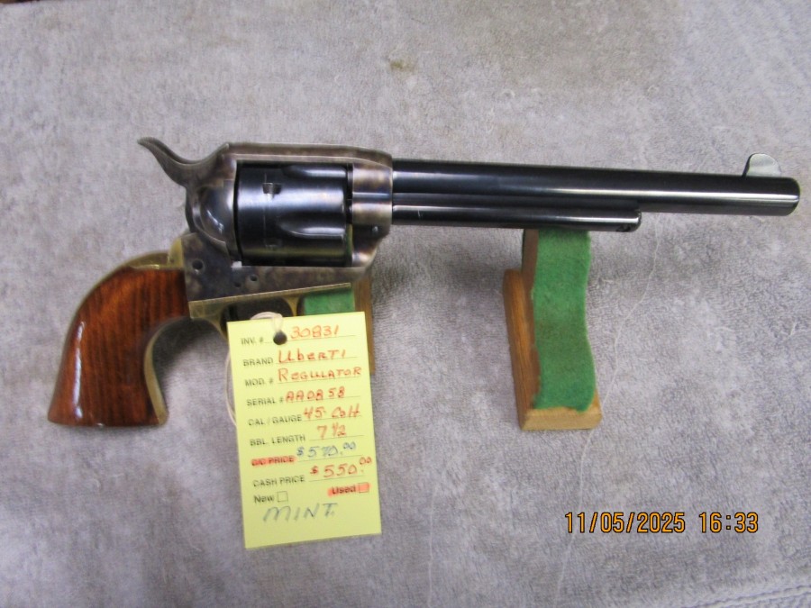 Uberti Regulator .45 Colt 7 1/2" barrel mint.  SOLD