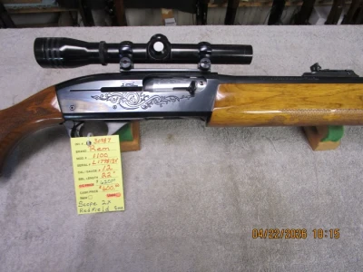 Remington model 1100 .12 ga, with Redfield 2x scope nice. - Product Image