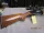 Remington model 1100 .12 ga, with Redfield 2x scope nice.